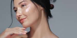 Woman with shiny, smooth skin after getting an IPL Photofacial for improved skin texture.